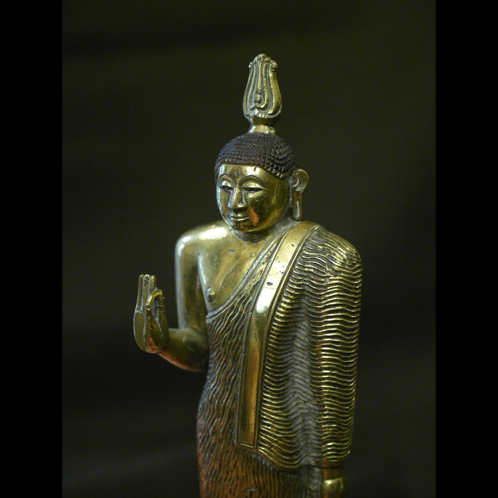 Extremely rare fire-gilt bronze Buddha from Kandy kingdom. Sri Lanka, middle 18th century.