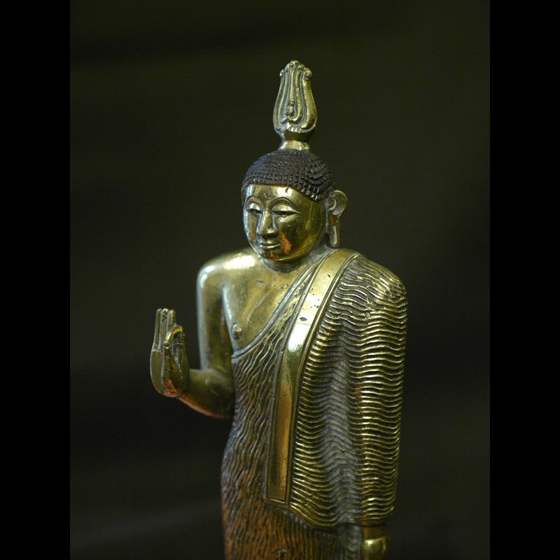 Extremely rare fire-gilt bronze Buddha from Kandy kingdom. Sri Lanka, middle 18th century.