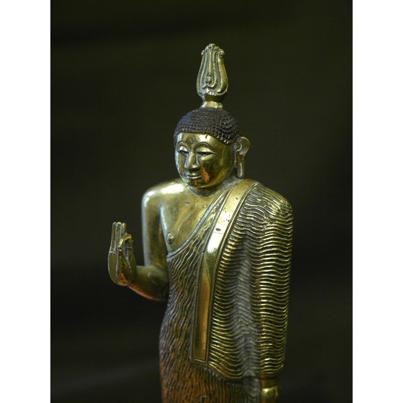 Extremely rare fire-gilt bronze Buddha from Kandy kingdom. Sri Lanka, middle 18th century.