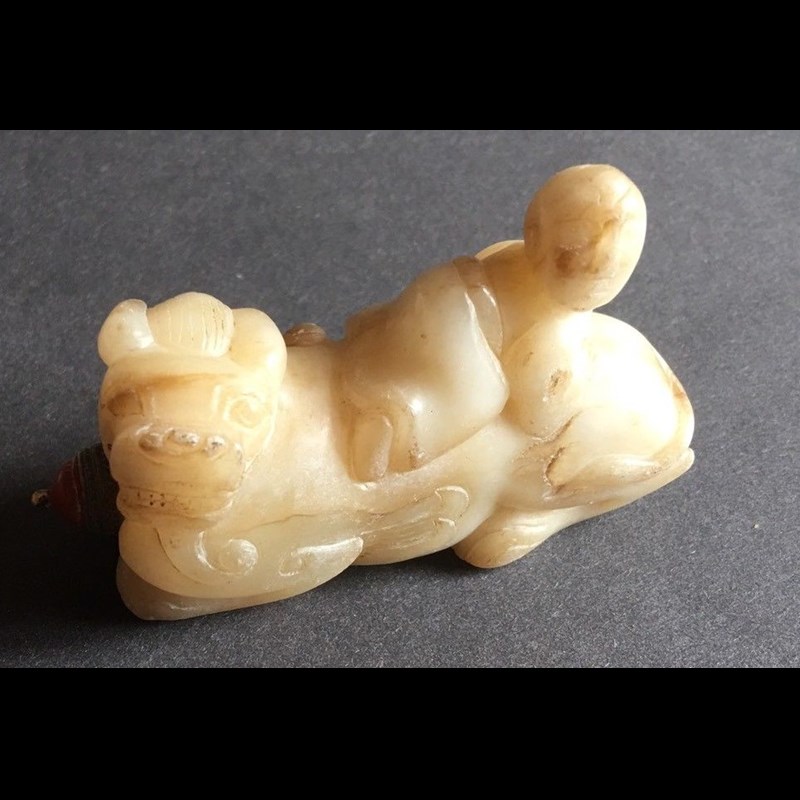 Extremely rare Tang Dynasty jade Bixie with child